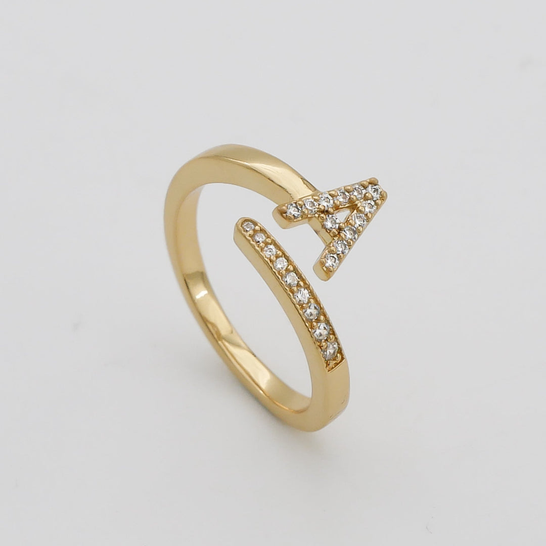 Women's gold plated adjustable pave initial ring, a perfect personalized gift.