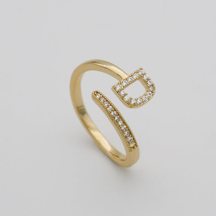 Chic pave initial adjustable ring, gold finish, perfect for daily outfits.
