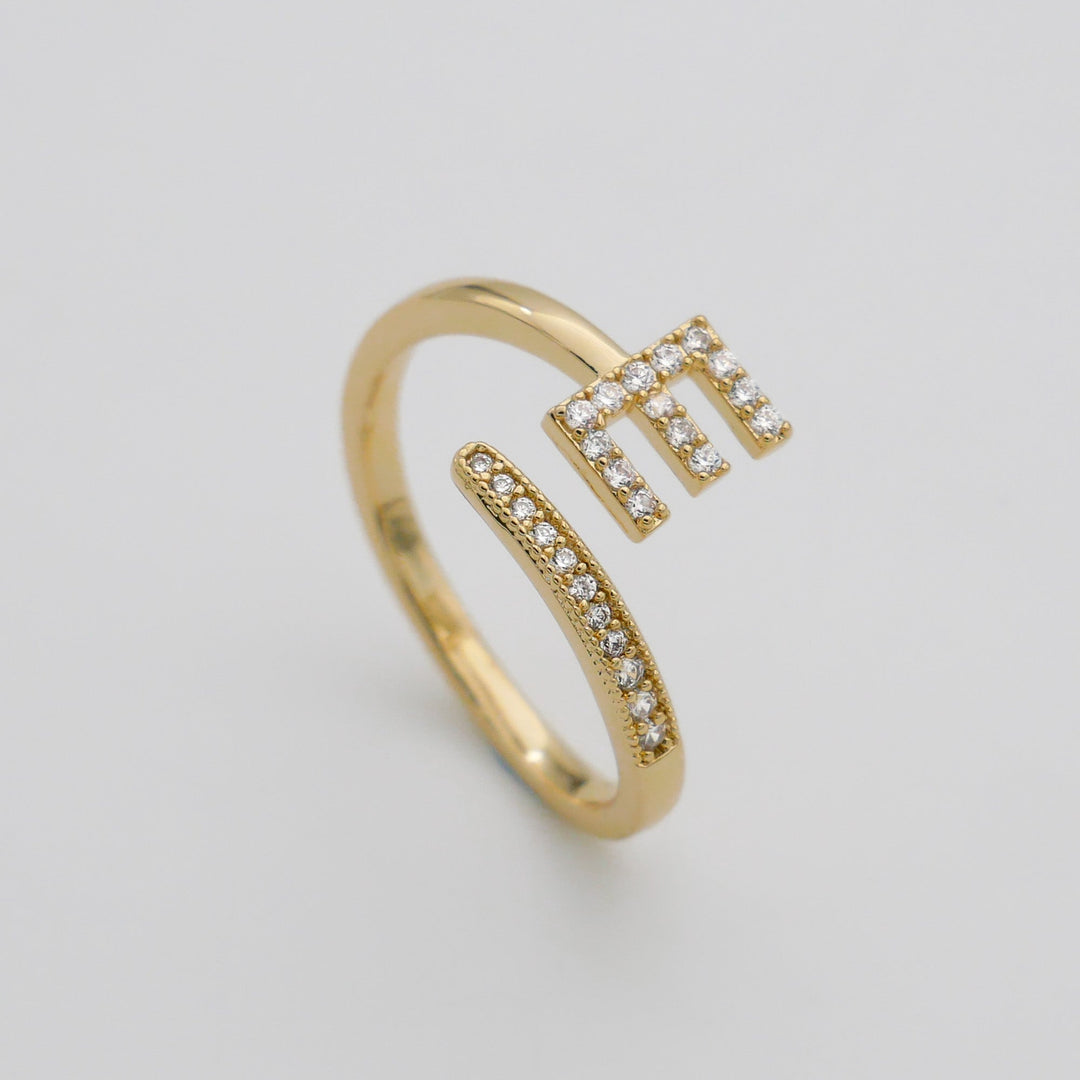 Sparkling pave initial women's ring, silver tone, adjustable for a snug fit.