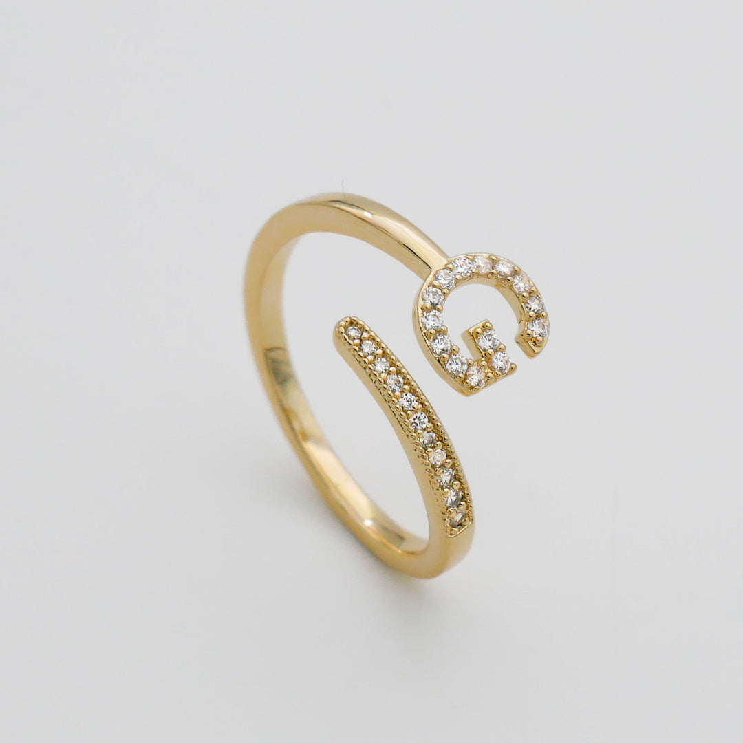 Custom jewelry: silver plated adjustable ring with a beautiful pave initial.