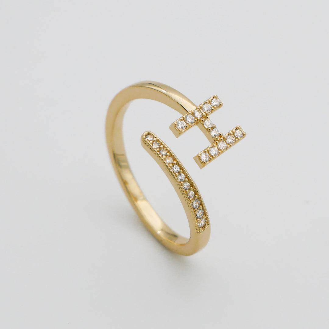 Everyday wear women's gold plated adjustable pave initial ring.
