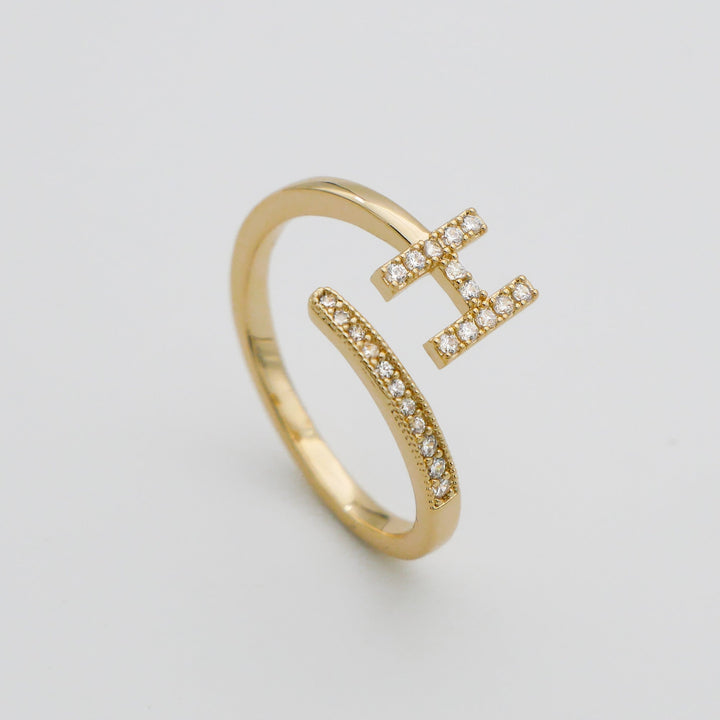 Everyday wear women's gold plated adjustable pave initial ring.