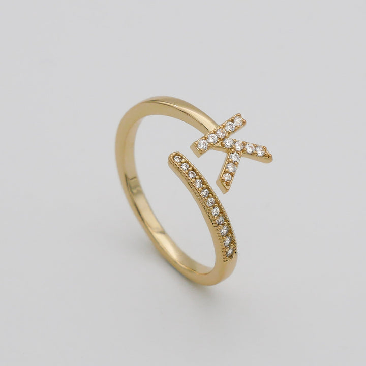 Silver plated adjustable ring, pave initial, adds a personal touch to any look.