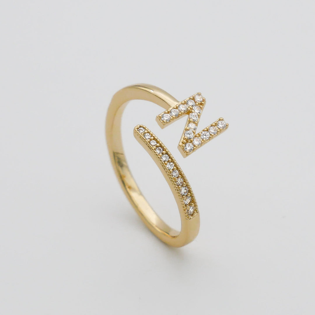 Silver tone adjustable initial ring, pave set, perfect for a custom statement.