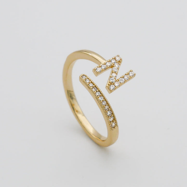 Silver tone adjustable initial ring, pave set, perfect for a custom statement.