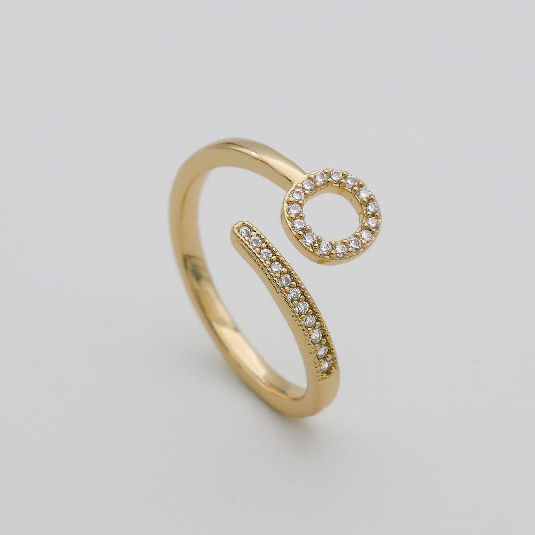 Women's custom initial ring, adjustable, gold plated, with pave detailing.