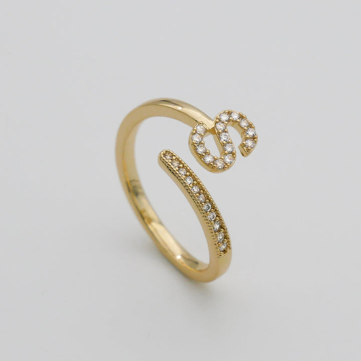 Personalized women's ring, adjustable, gold tone, featuring a pave initial.