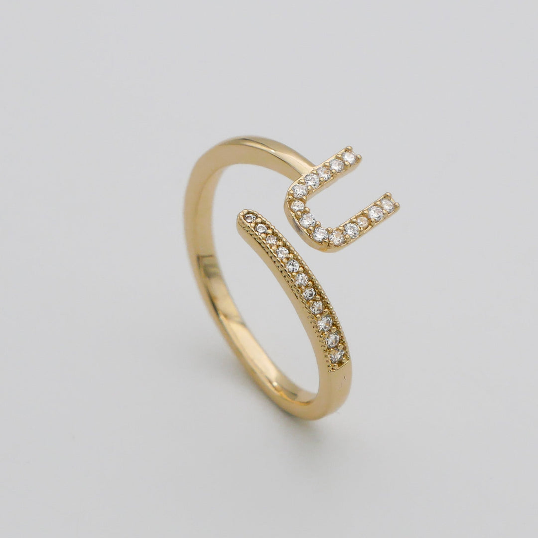 Women's adjustable gold plated pave initial ring, a fashionable custom piece.