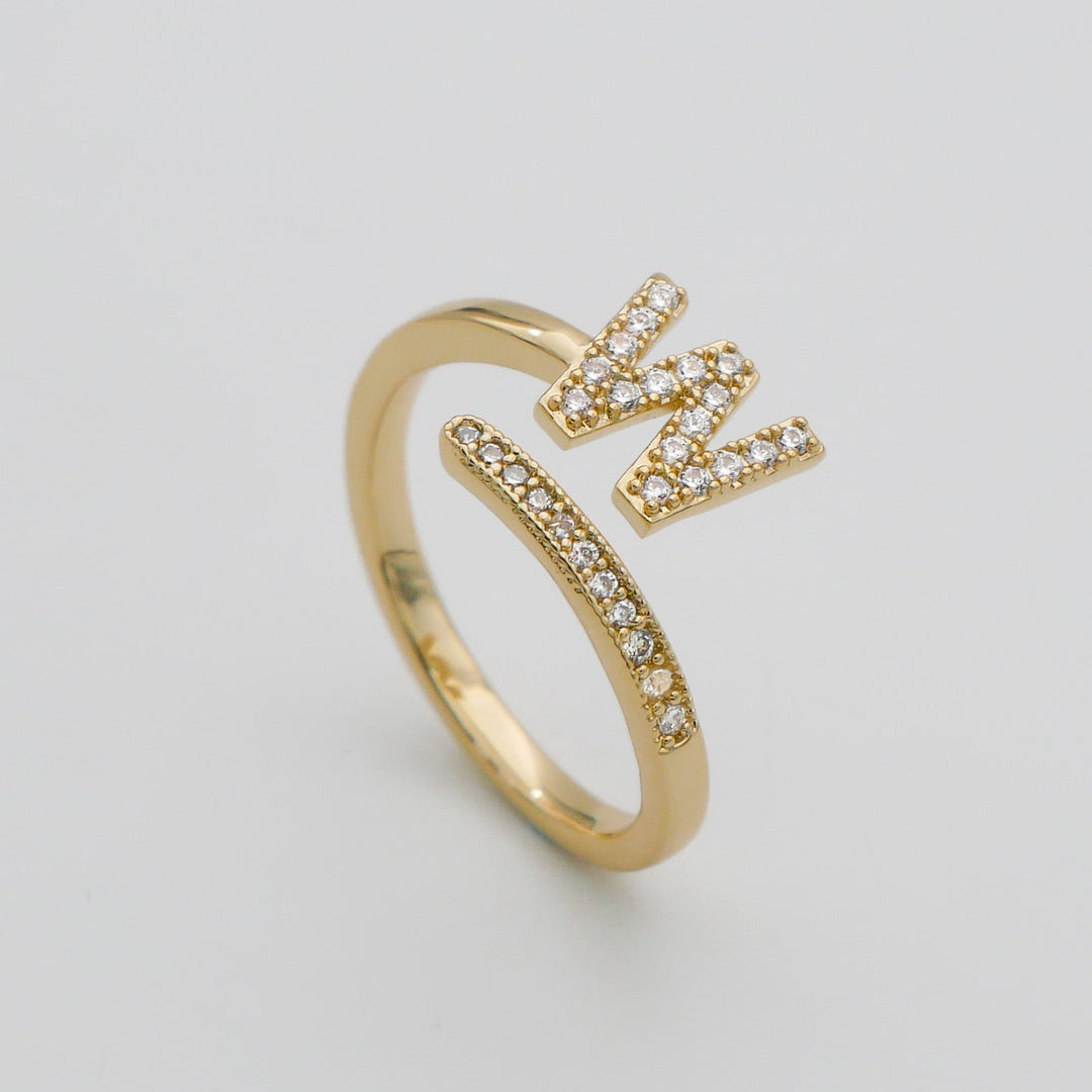 Gold plated pave initial adjustable ring, perfect for a personalized statement.