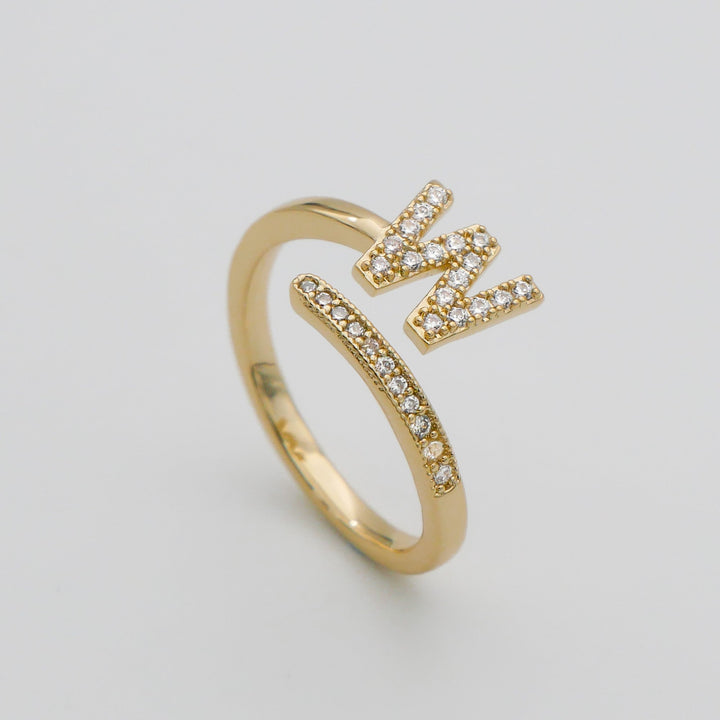 Gold plated pave initial adjustable ring, perfect for a personalized statement.