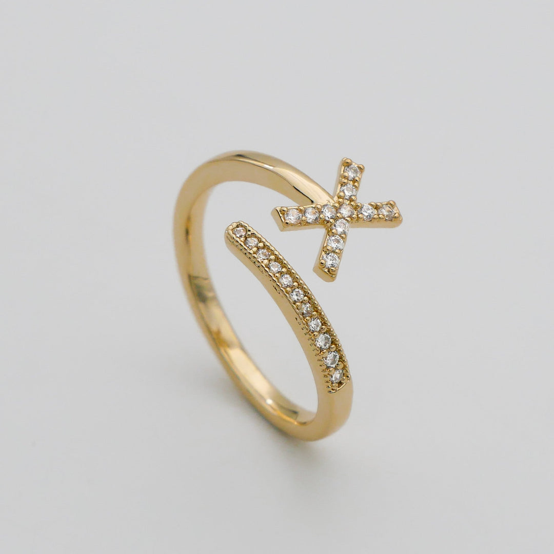 Adjustable silver plated ring with a custom pave initial, women's daily wear.