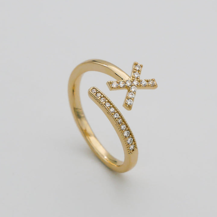 Adjustable silver plated ring with a custom pave initial, women's daily wear.