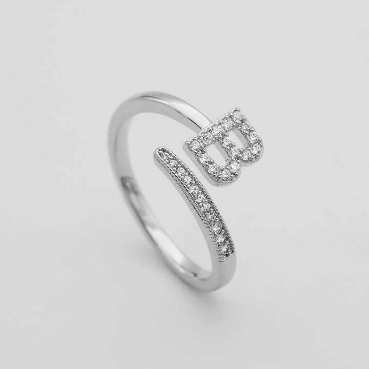 Pave initial custom ring, adjustable, gold plated, a stylish women's accessory.
