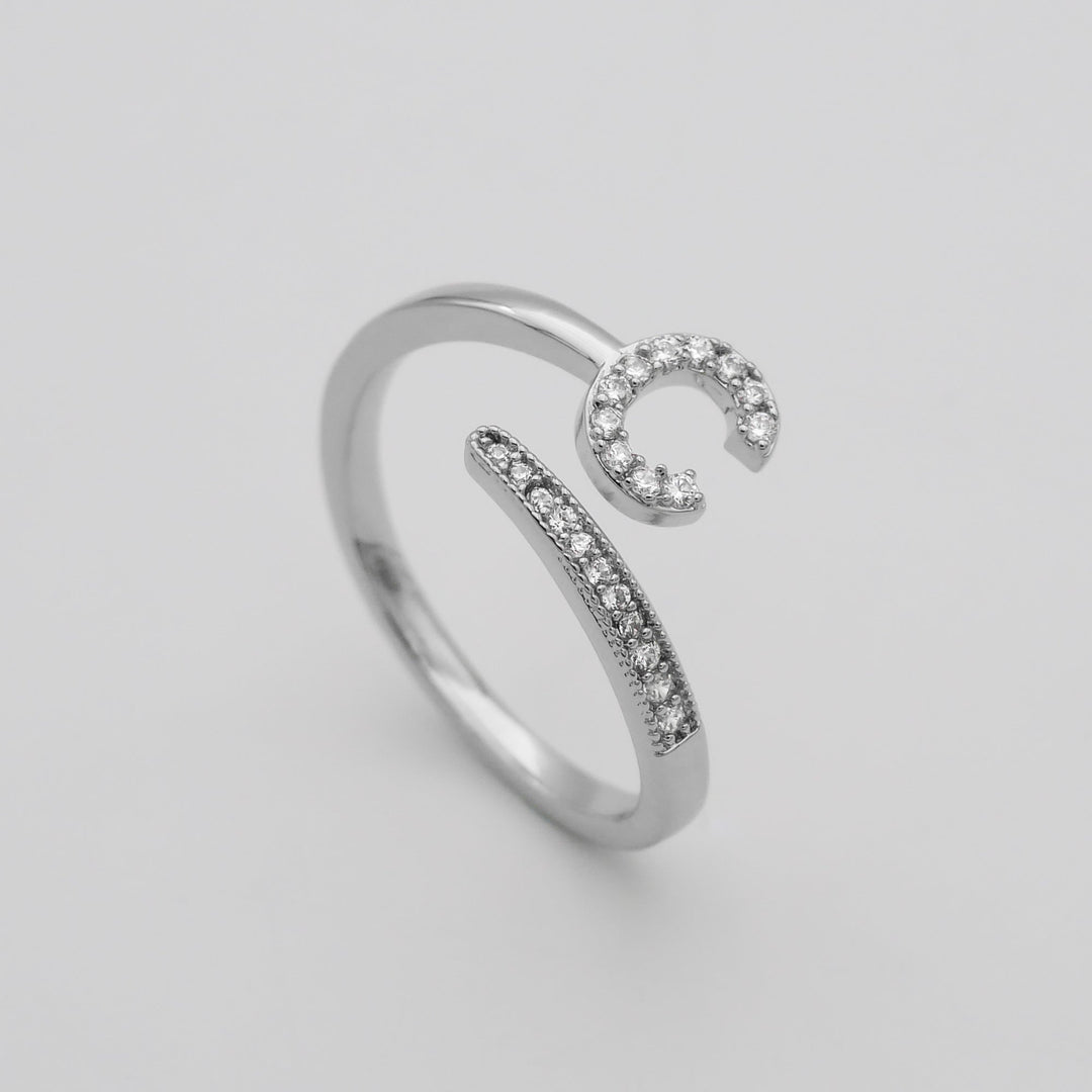 Silver plated personalized pave initial adjustable ring for elegant women.
