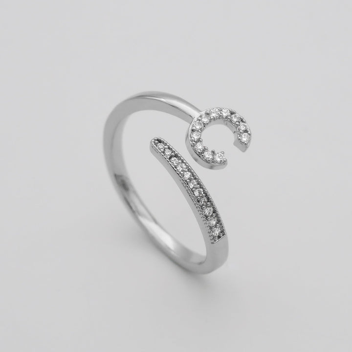 Silver plated personalized pave initial adjustable ring for elegant women.
