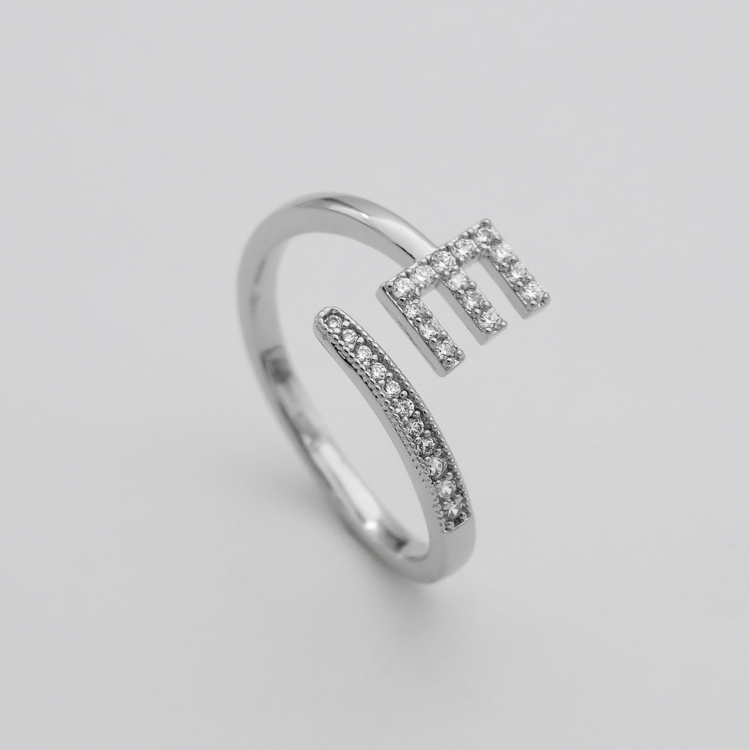Women's adjustable custom pave initial ring, silver tone, versatile and unique.