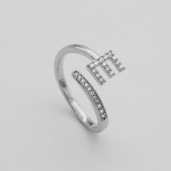 Women's adjustable custom pave initial ring, silver tone, versatile and unique.