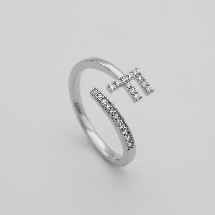 Sparkling pave initial adjustable ring, gold plated, a delightful personalized gift.
