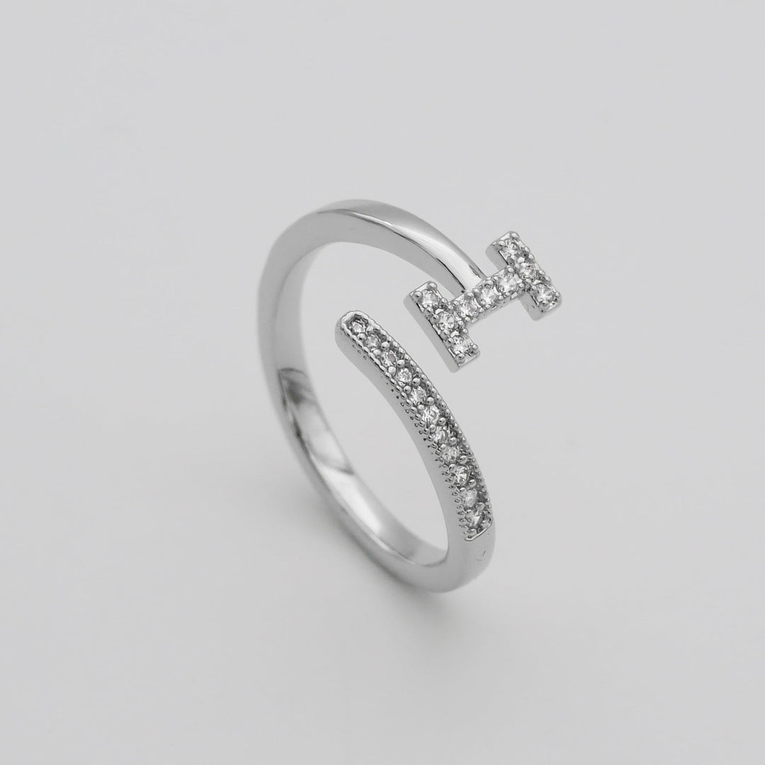 Custom pave letter ring, adjustable, silver tone, perfect for women's style.