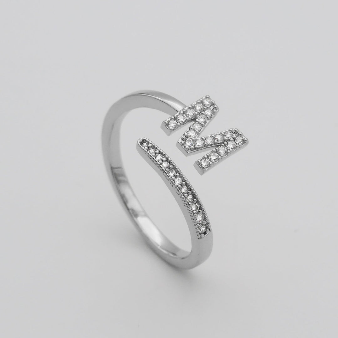 Personalized silver plated adjustable initial ring, great for layering.