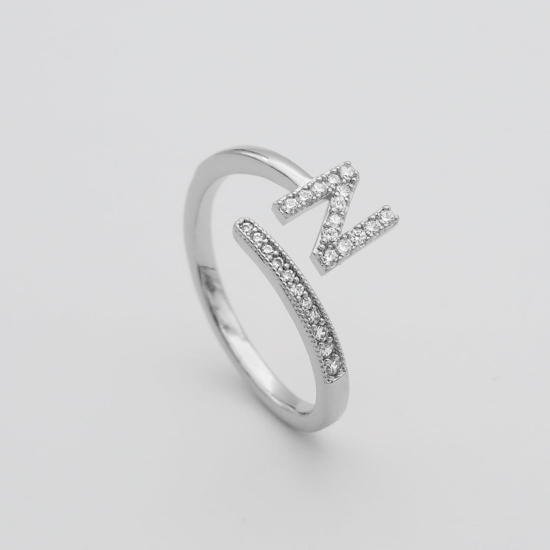 Women's adjustable ring, gold plated, featuring a custom pave initial.