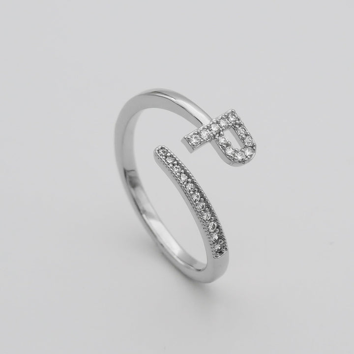 Gold plated everyday wear adjustable pave initial ring for women.