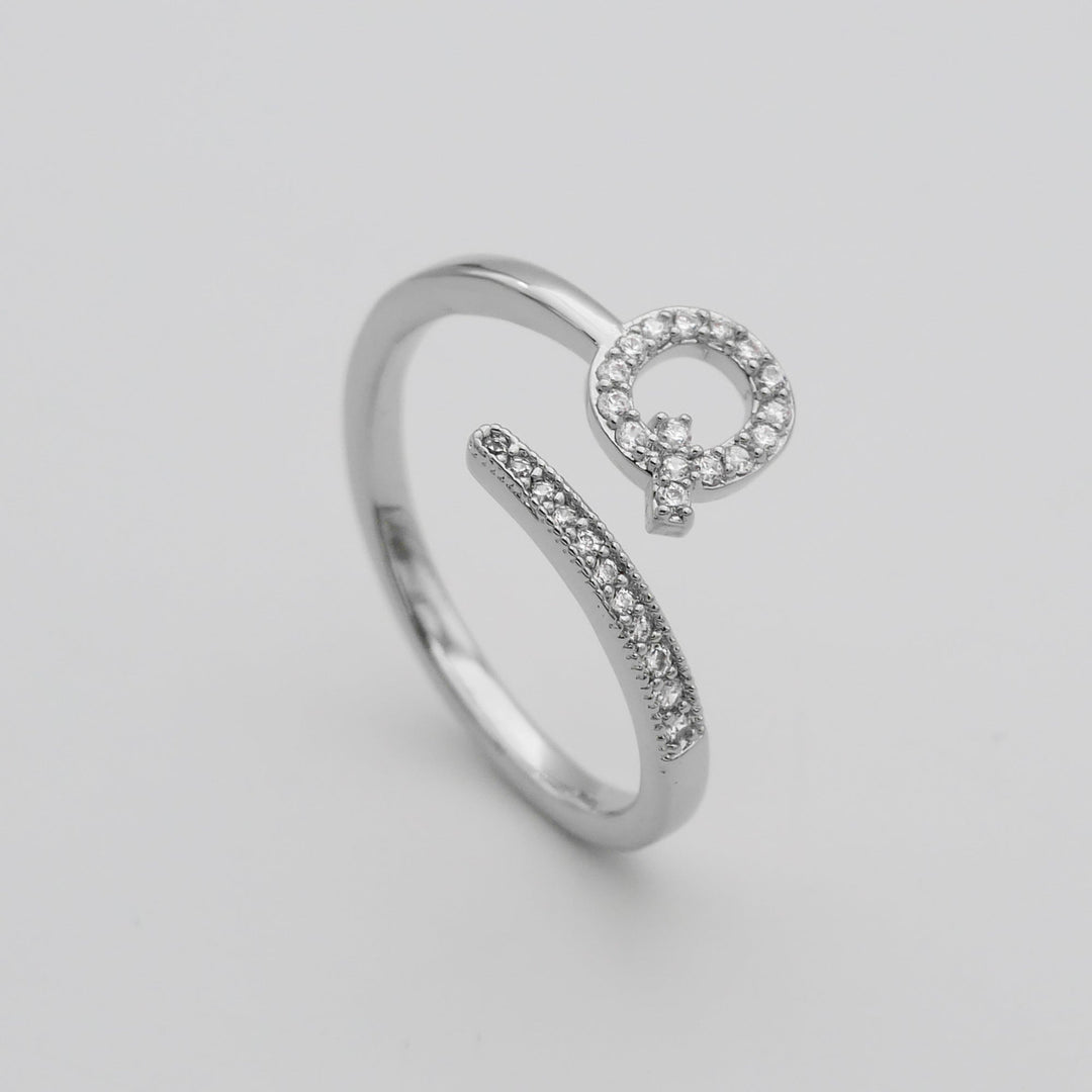Silver plated adjustable initial ring with pave stones, personalized touch.
