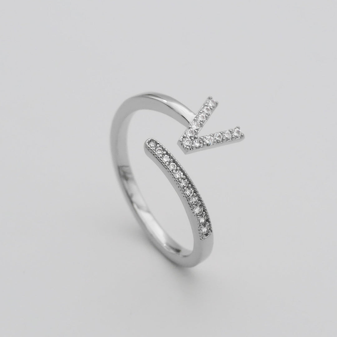 Women's adjustable gold plated ring, custom pave initial, versatile and elegant.