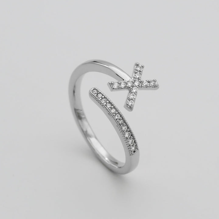 Gold plated adjustable pave initial ring, a cherished personalized accessory.