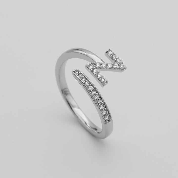 Women's personalized gold plated adjustable pave initial ring, a timeless gift.