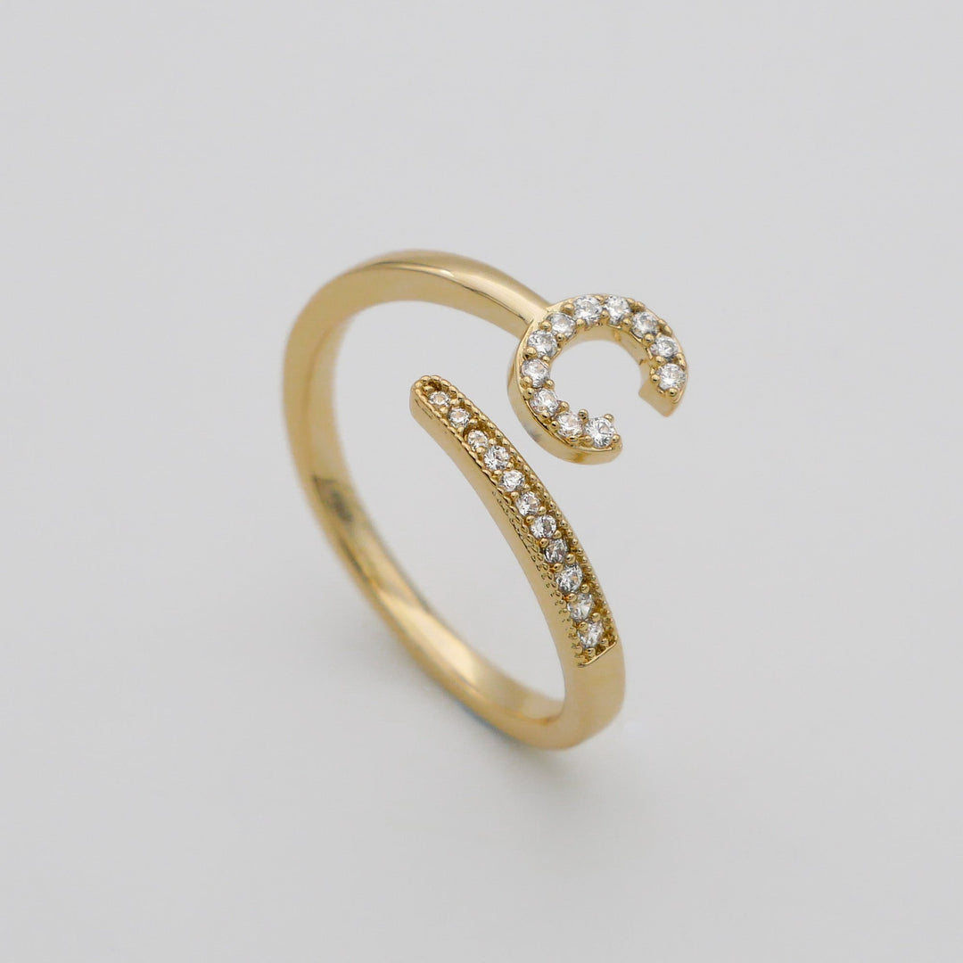 Women's adjustable custom initial ring, pave detailed, ideal for gifting.