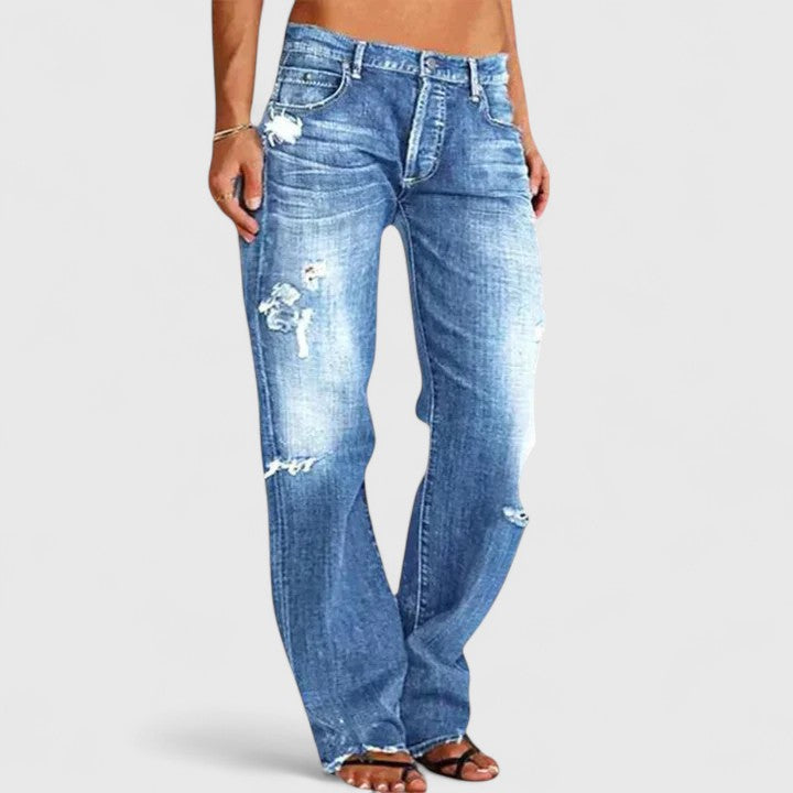 Women's Grace elegant wide-leg jeans in classic blue denim, offering a stylish & comfortable low-rise fit.