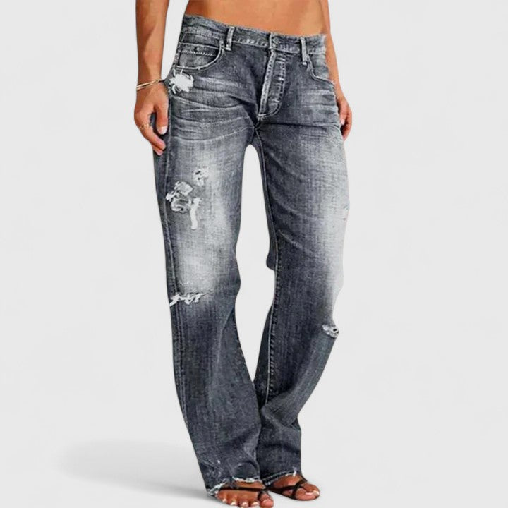 Grace elegant wide-leg women's jeans. Comfortable blue denim with a fashionable low-rise cut for stylish versatility.