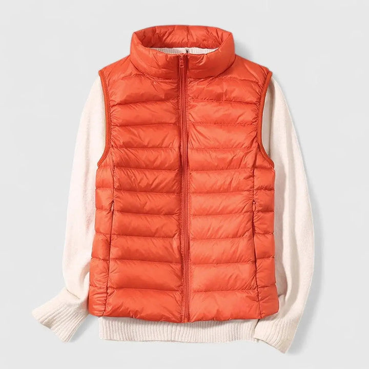 Women's Grace lightweight quilted puffer vest in black, perfect for transitional autumn layering.