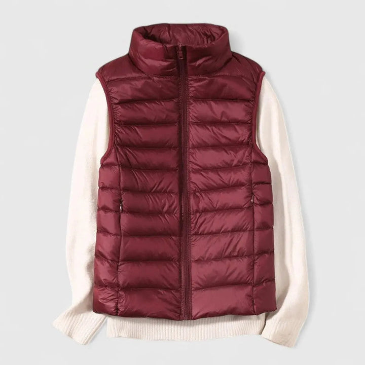 Front view of Grace women's lightweight puffer vest, a versatile sleeveless outerwear piece.
