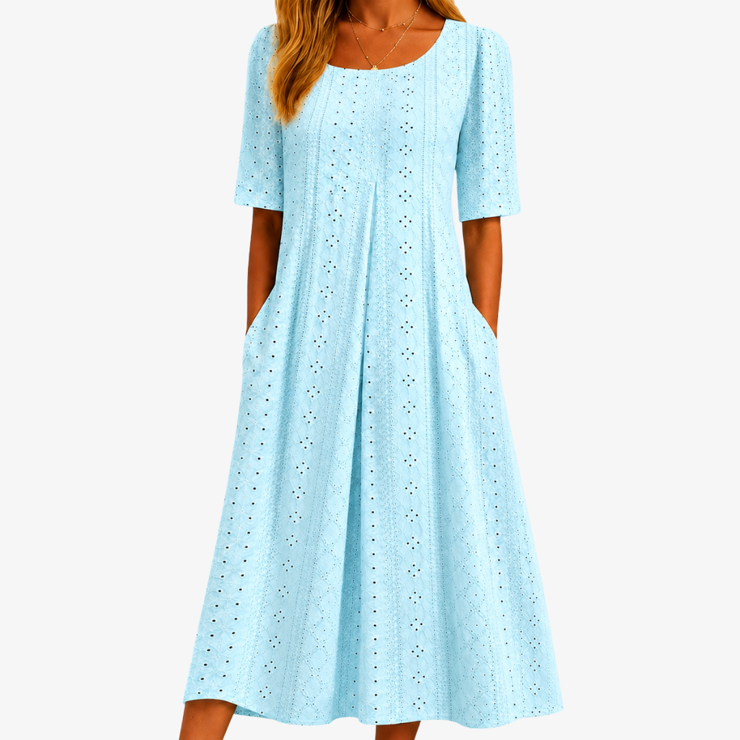 Women's graceful sage green midi dress with pockets, ideal for elegant or casual summer and spring wear.