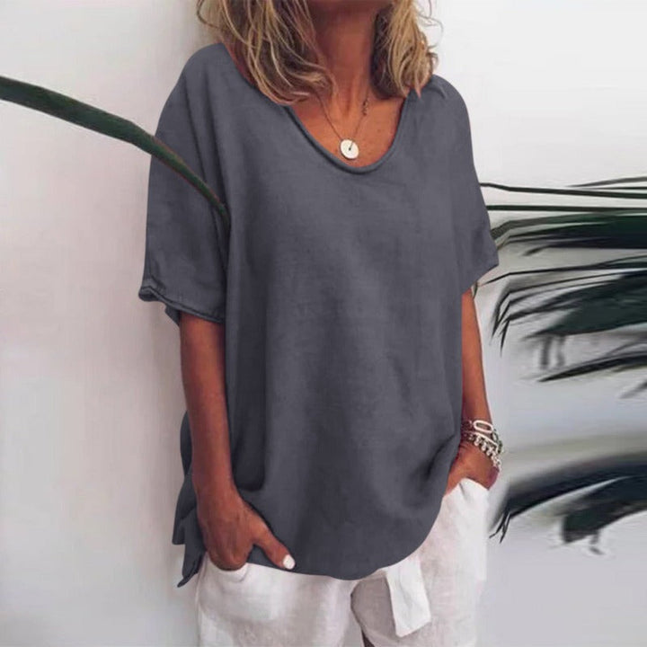 Women's Graceful V-Neck Flow Blouse in a light color, perfect for elegant casual or workwear style.
