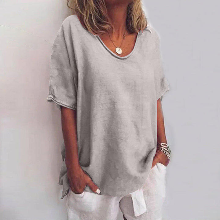 Comfortable women's flowy V-neck blouse with long sleeves, ideal for everyday chic and versatile styling.