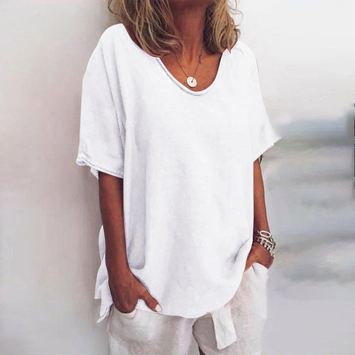 Elegant women's V-neck flow blouse, long sleeve, suitable for stylish workwear or sophisticated casual outfits.