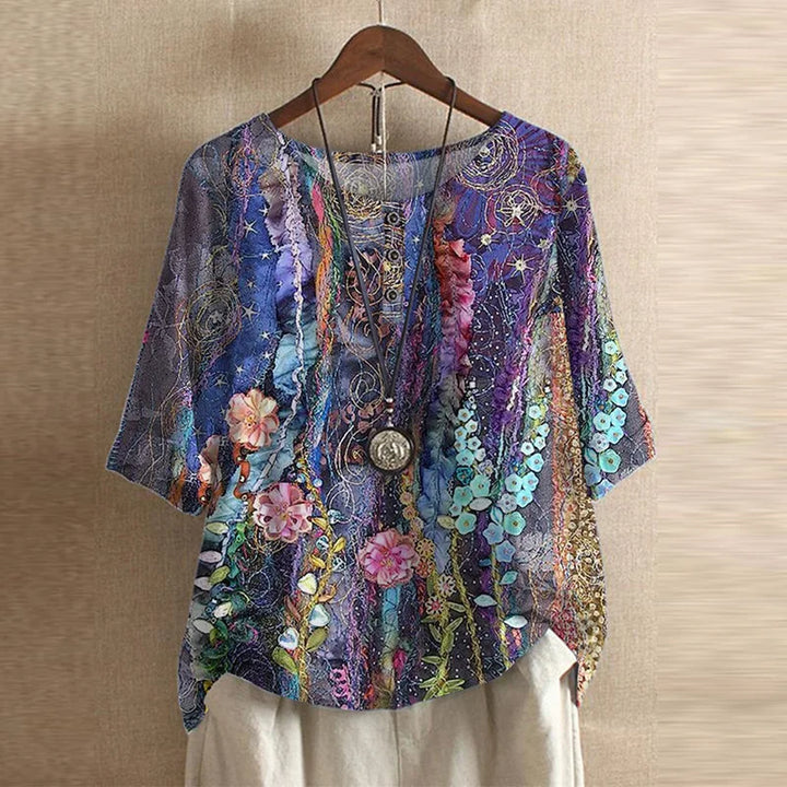 Chic women's medium sleeve graphic blouse. Crew neck, curved hem. Ideal casual summer & autumn top.