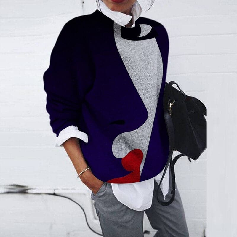 Stylish women's graphic sweatshirt with crew neck. Trendy statement piece for fall & winter fashion. Relaxed fit.