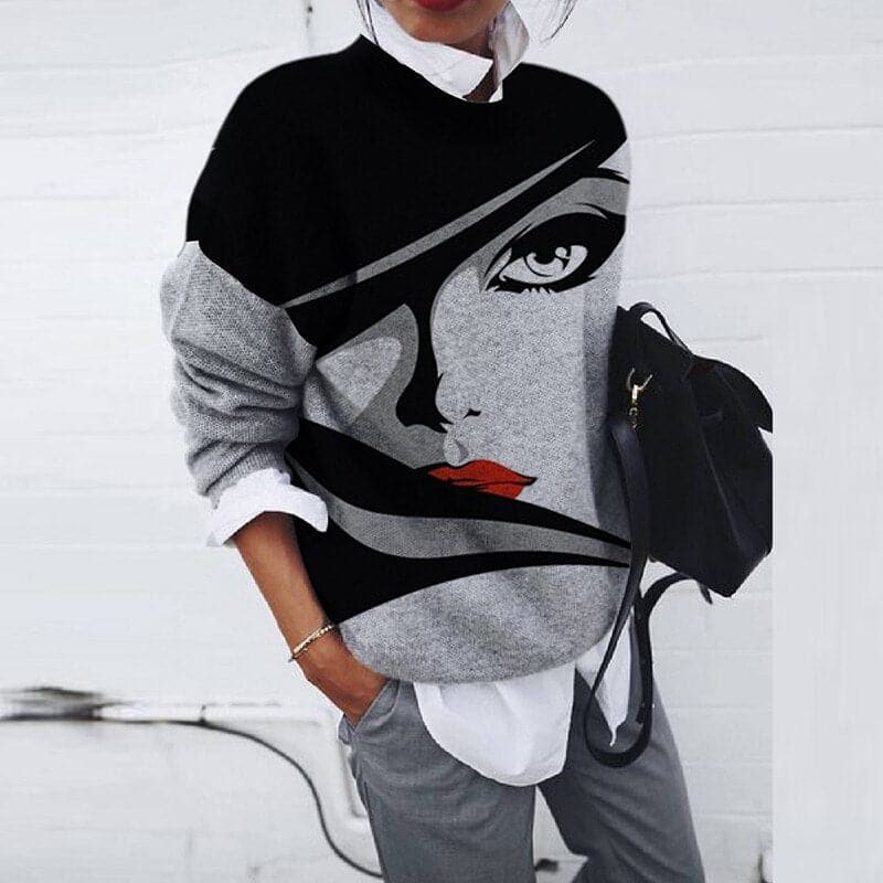 Relaxed fit women's graphic print crew neck sweatshirt. Ideal casual wear, long sleeve comfort for fall and winter.