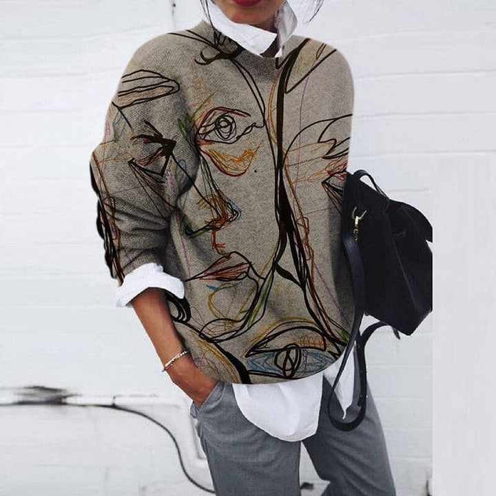 Statement women's graphic print crew neck sweatshirt. Relaxed fit, long sleeve for stylish casual fall/winter wear.