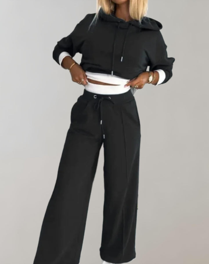 Women's gray cropped hoodie and wide leg trouser loungewear set for ultimate comfort and casual style.