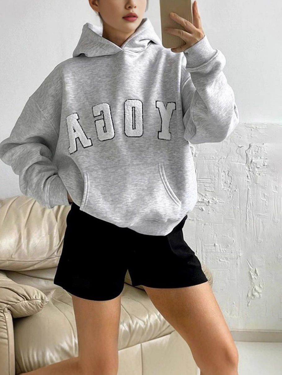 Stylish women's activewear hoodie, perfect for yoga or lounging, featuring a unique trendy print.