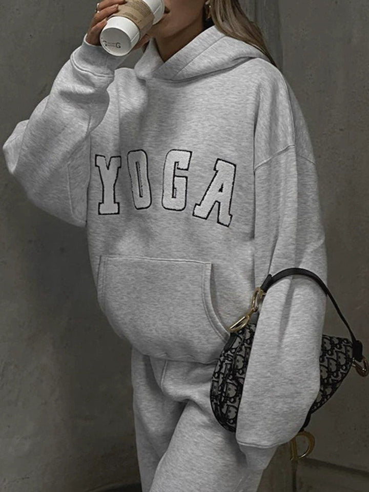 Comfortable fit gray hoodie for women, ideal for yoga sessions and casual loungewear.
