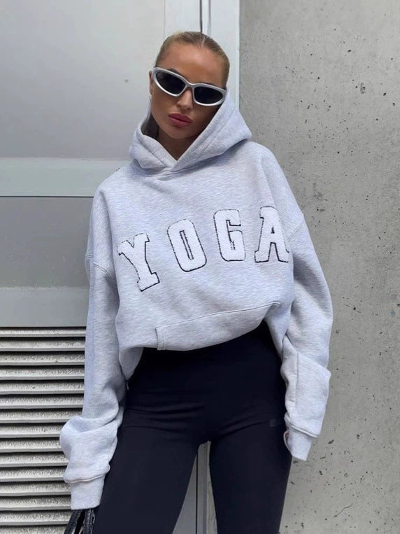 Athleisure women's gray hoodie with a stylish, eye-catching print for everyday wear.
