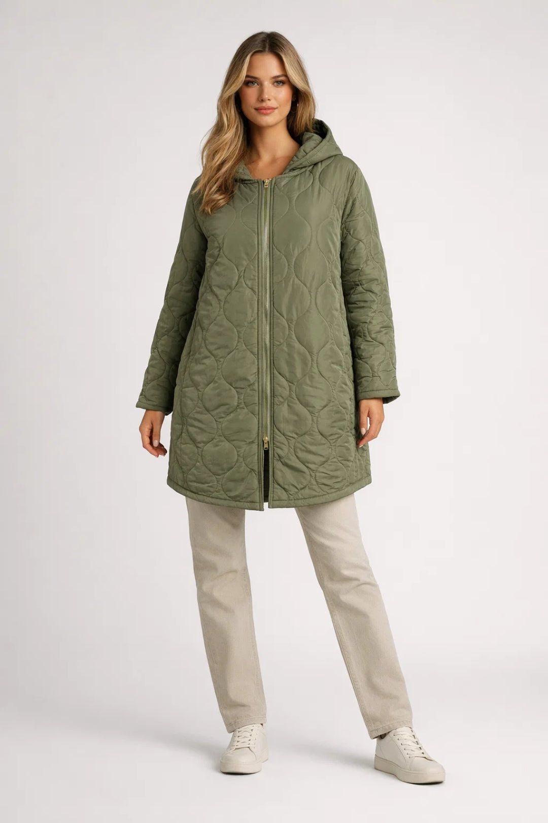 Women's green quilted hooded coat, stylish knee-length autumn fashion outerwear.