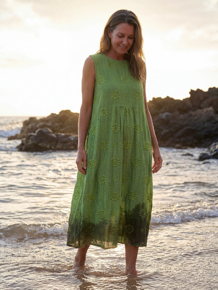 Comfortable women's green textured midi dress. Sleeveless, relaxed fit for effortless everyday summer style.