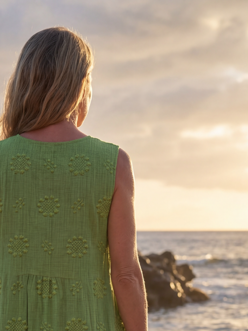 Women's relaxed fit green textured midi dress, a comfortable sleeveless summer dress perfect for garden or everyday.